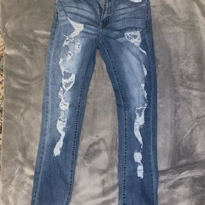 Lightly worn ripped skinny jeans